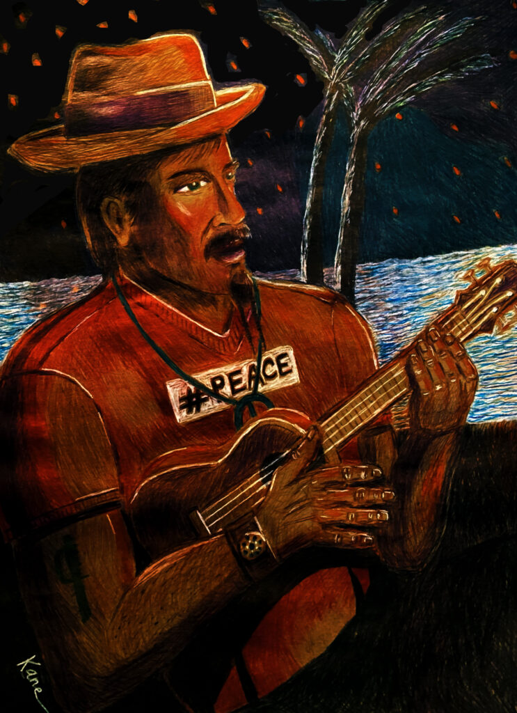Ukulele player next to the ocean.